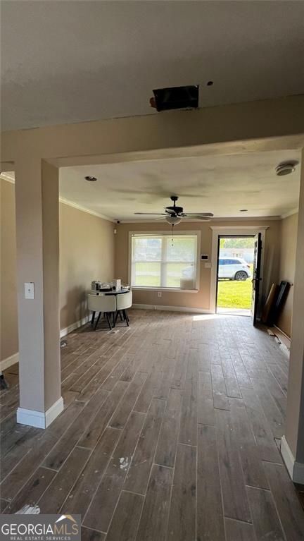 156 East Geer Street Colquitt, GA 39837 - Photo 5 of 19 a view of a livingroom with a patio and a fireplace