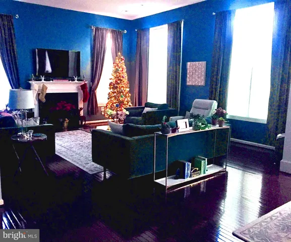 a bathroom with a sink mirror and a bathtub