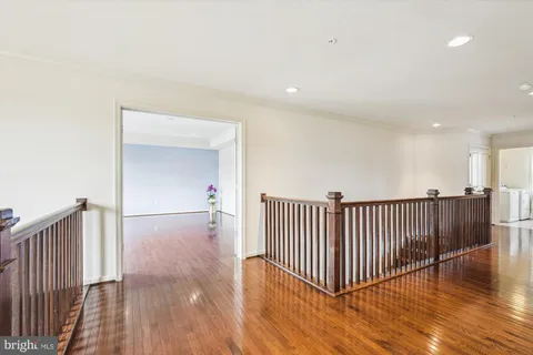 a view of an empty room with closet area