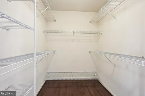 a view of a house with a swimming pool and a yard