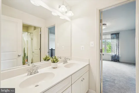 a picture of a bathroom with a shower