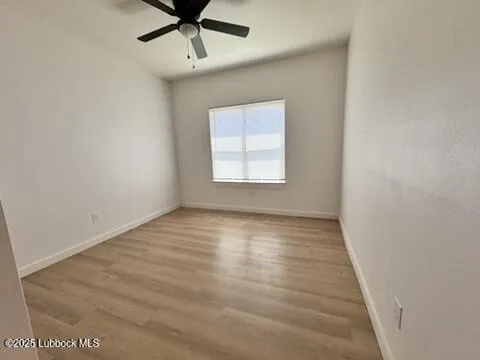 a bathroom with a double vanity sink toilet and shower