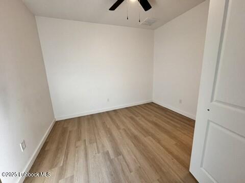 5719 Kemper Street, Unit A Lubbock, TX 79416 - Photo 19 of 21 a view of a room with wooden floor and a sink