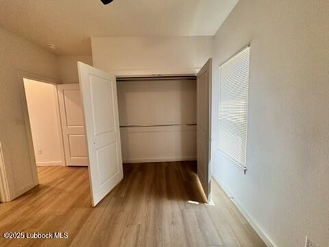5719 Kemper Street, Unit A Lubbock, TX 79416 - Photo 20 of 21 a view of wooden floor in a kitchen
