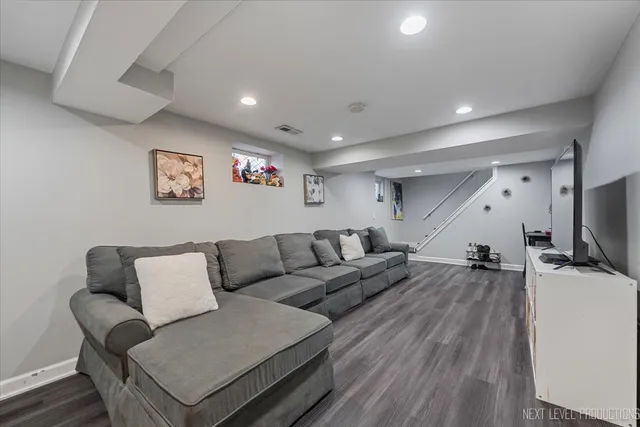 a living room with furniture and a couch