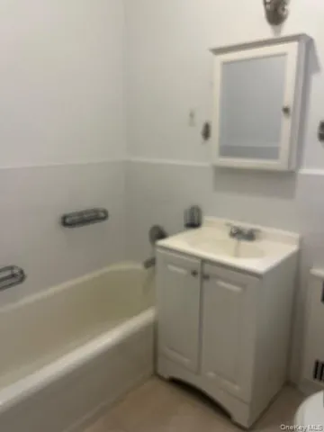 a bathroom with a sink and a bathtub