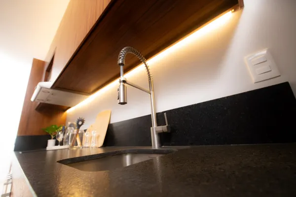 a bedroom with bed and a window