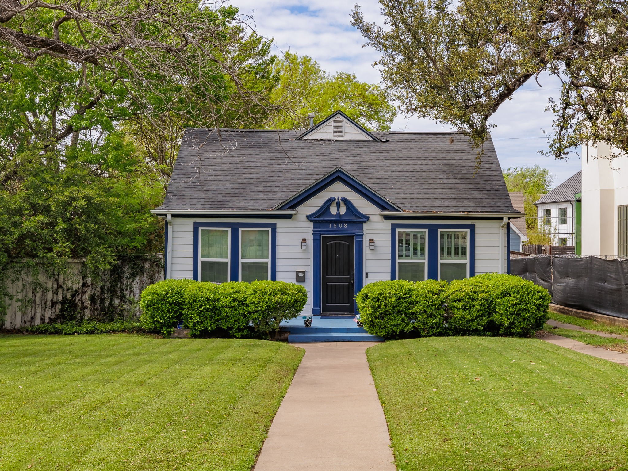 1508 Pease Road Austin, TX 78703 - Photo 1 of 1 a front view of a house with a yard
