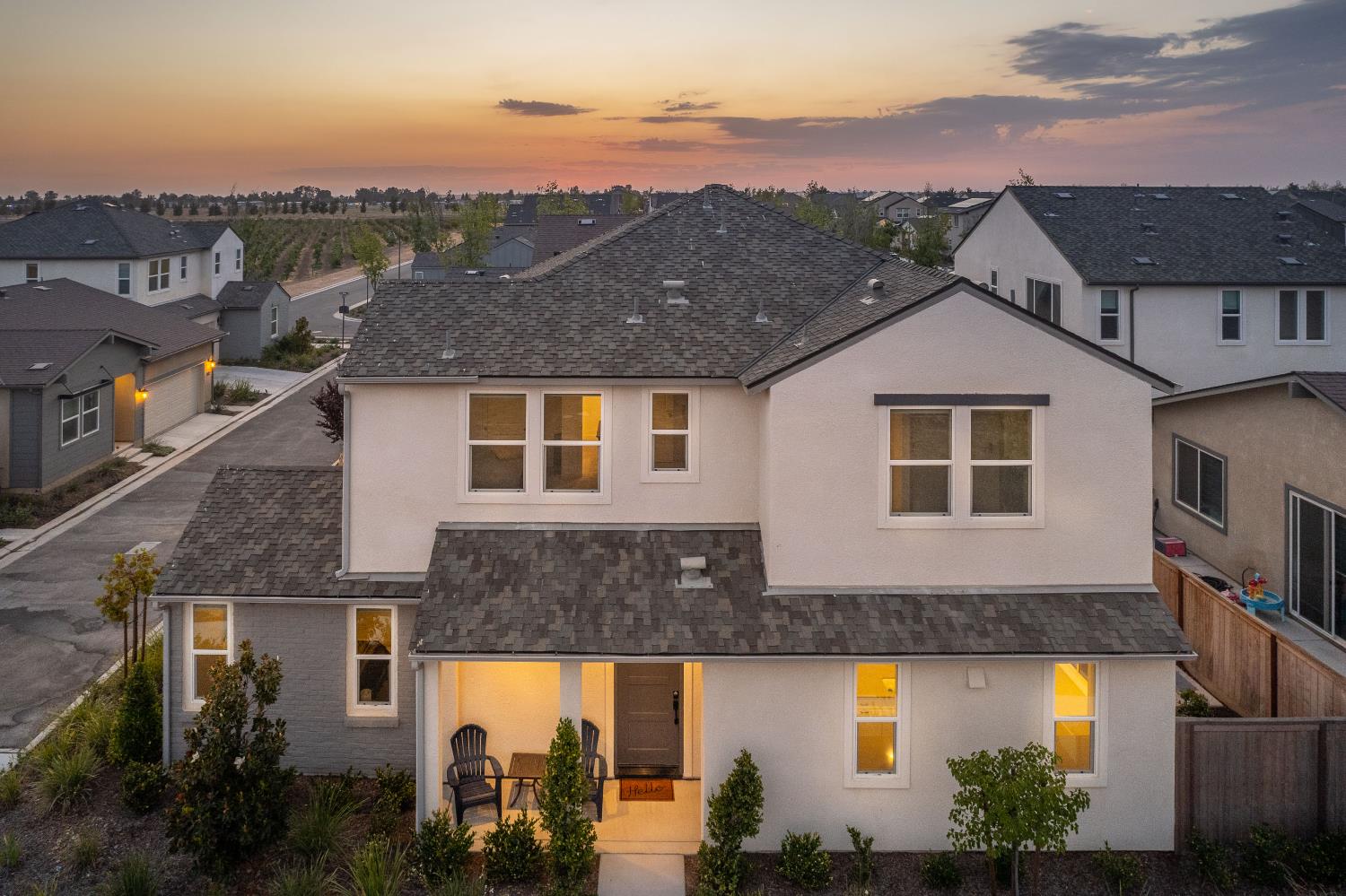849 Livio Way Madera, CA 93636 - Photo 3 of 74 a front view of a house with a yard and mountain view in back