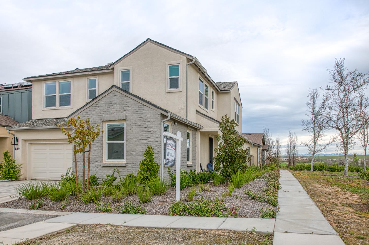 849 Livio Way Madera, CA 93636 - Photo 46 of 74 a front view of a house with a yard