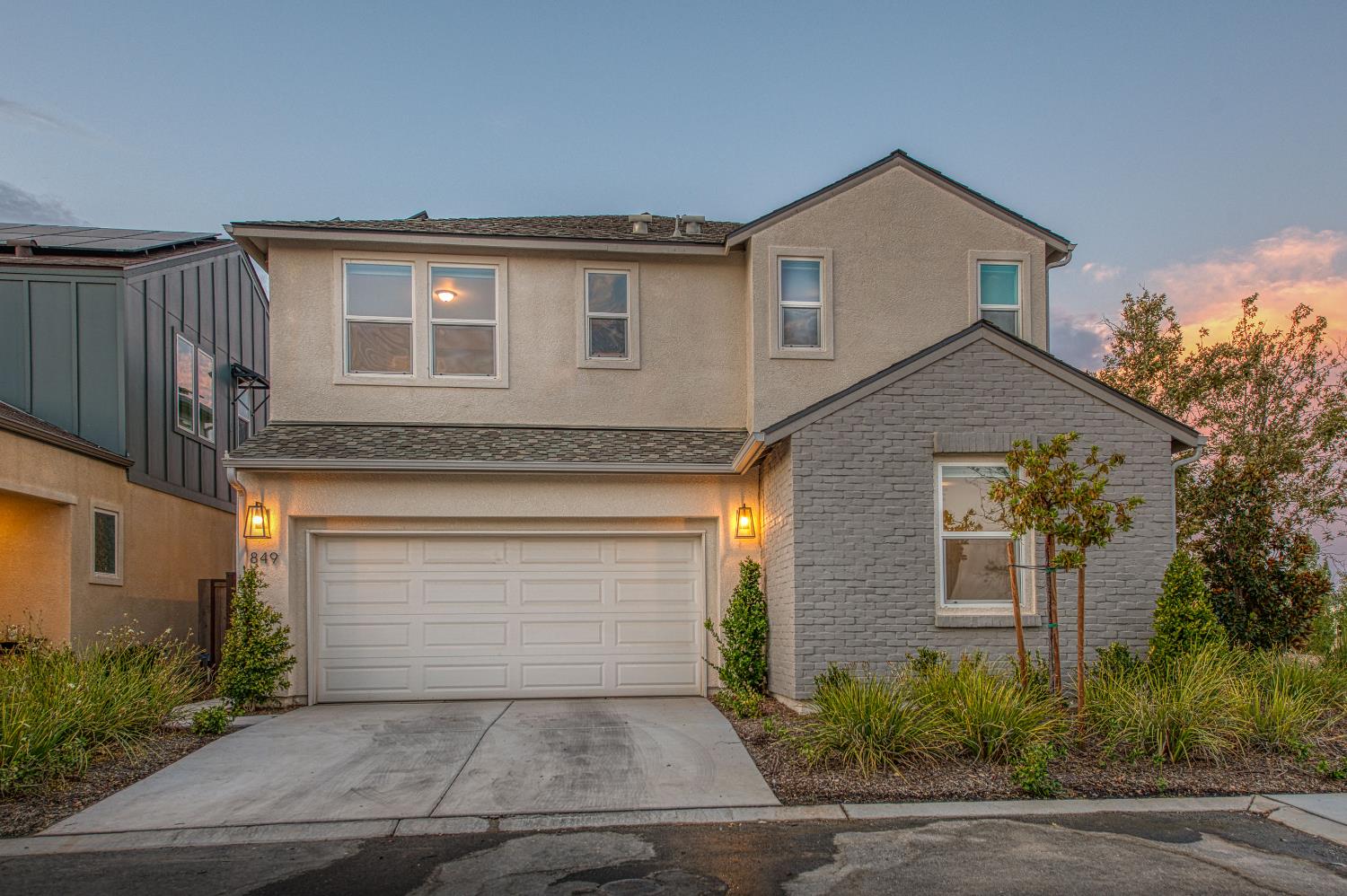 849 Livio Way Madera, CA 93636 - Photo 67 of 74 a front view of a house with yard and parking