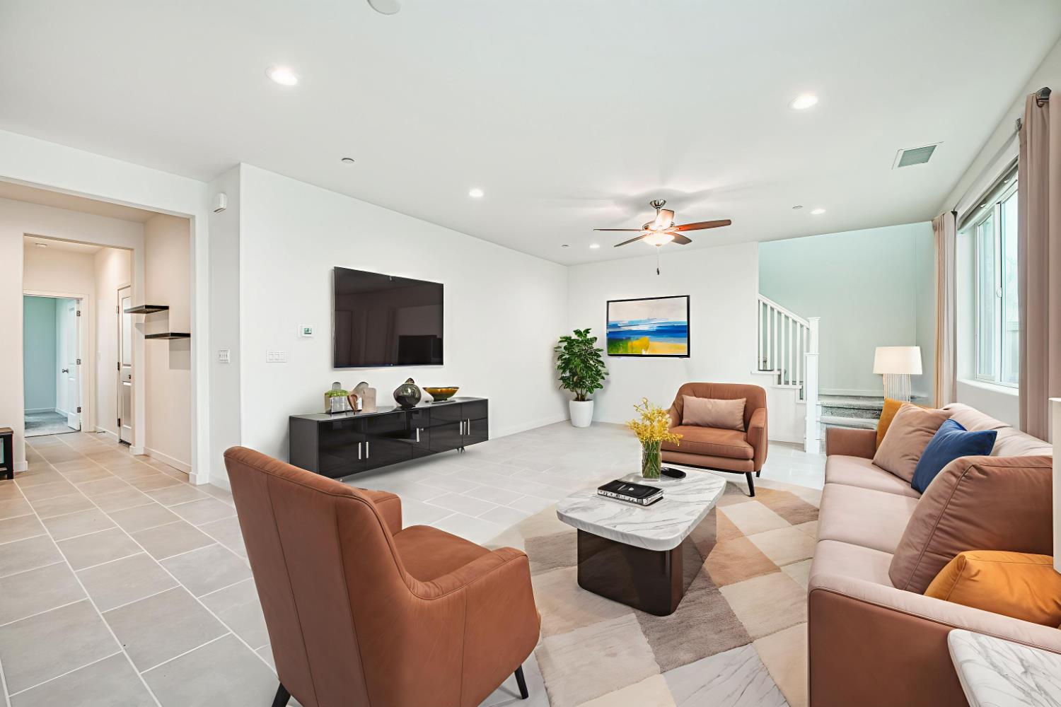 849 Livio Way Madera, CA 93636 - Photo 7 of 74 a living room with furniture and a flat screen tv