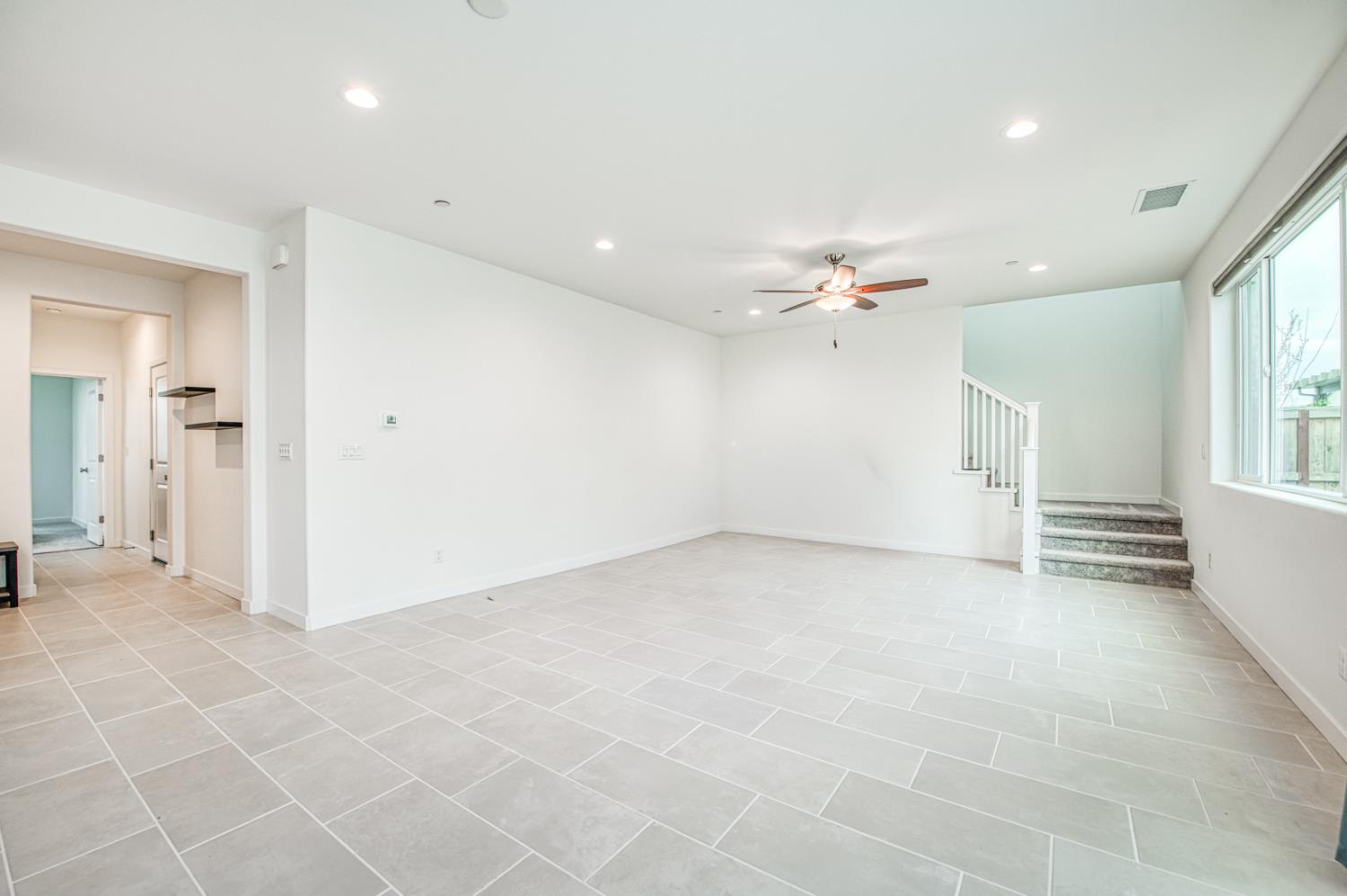 849 Livio Way Madera, CA 93636 - Photo 10 of 74 a view of an empty room with a window