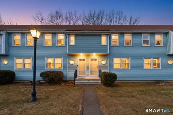 a front view of a house having yard