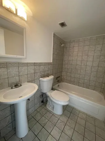 $220,000 | 13155 Ixora Court, Unit 201, North Miami, FL 33181