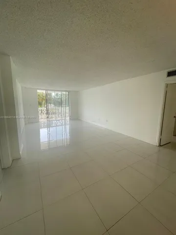 $220,000 | 13155 Ixora Court, Unit 201, North Miami, FL 33181