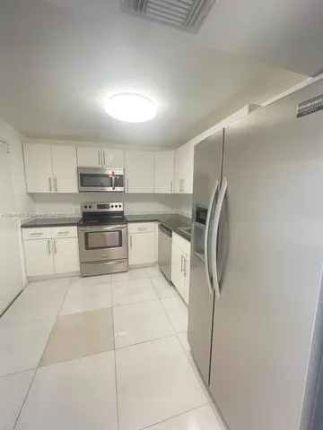 $220,000 | 13155 Ixora Court, Unit 201, North Miami, FL 33181