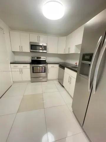 $220,000 | 13155 Ixora Court, Unit 201, North Miami, FL 33181