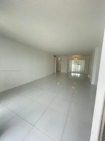 $220,000 | 13155 Ixora Court, Unit 201, North Miami, FL 33181