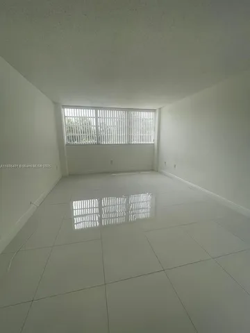 $220,000 | 13155 Ixora Court, Unit 201, North Miami, FL 33181