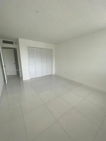 $220,000 | 13155 Ixora Court, Unit 201, North Miami, FL 33181