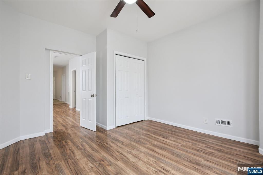750 South 17th Street Newark, NJ 07103 - Photo 18 of 25 wooden floor in an empty room
