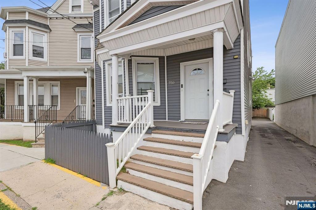 750 South 17th Street Newark, NJ 07103 - Photo 25 of 25 a view of a house with wooden floor and a porch