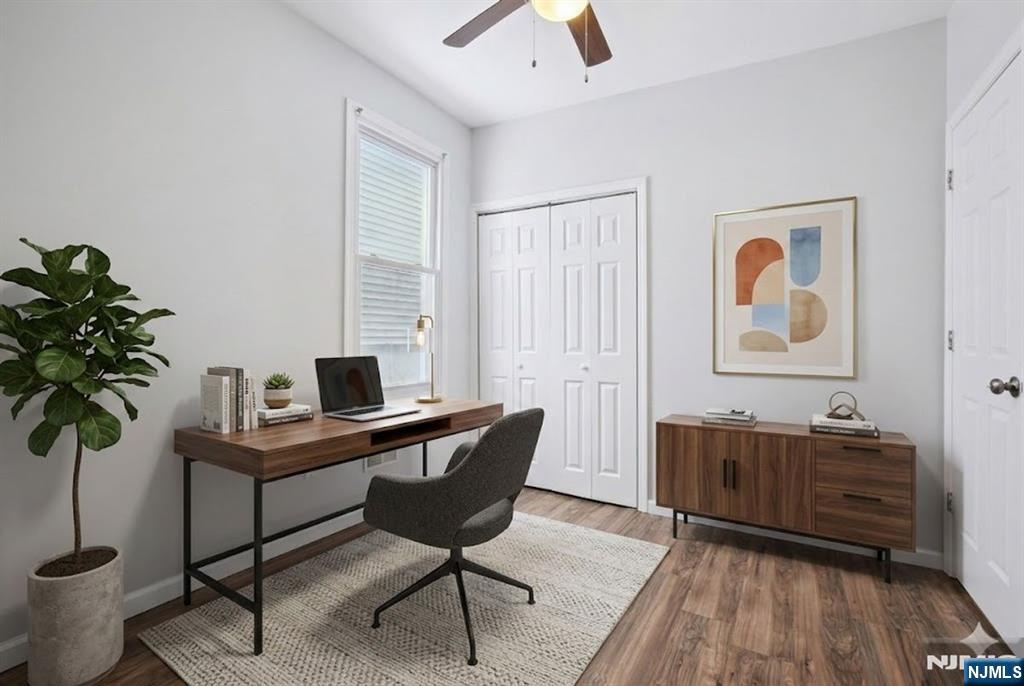 750 South 17th Street Newark, NJ 07103 - Photo 9 of 25 a view of a workspace with furniture and a potted plant