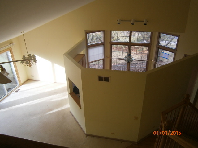N686 Chelsea Circle Winfield, IL 60190 - Photo 16 of 25 a view of a hallway with windows