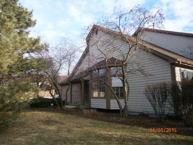 N686 Chelsea Circle Winfield, IL 60190 - Photo 3 of 25 a view of a house with a yard