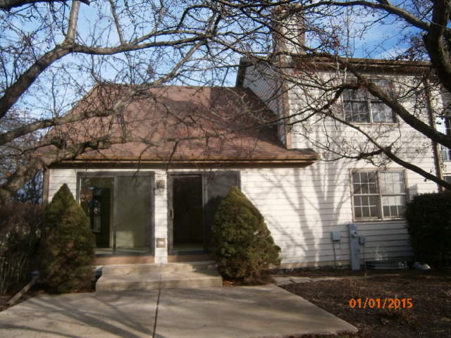 N686 Chelsea Circle Winfield, IL 60190 - Photo 4 of 25 a view of entryway with a tree
