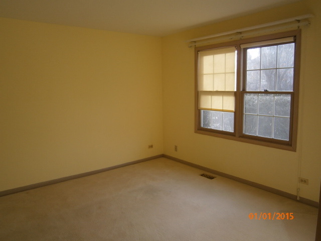 N686 Chelsea Circle Winfield, IL 60190 - Photo 10 of 25 an empty room with a window