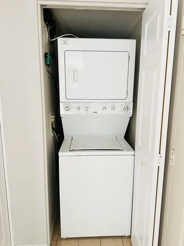a view of a living room and a balcony