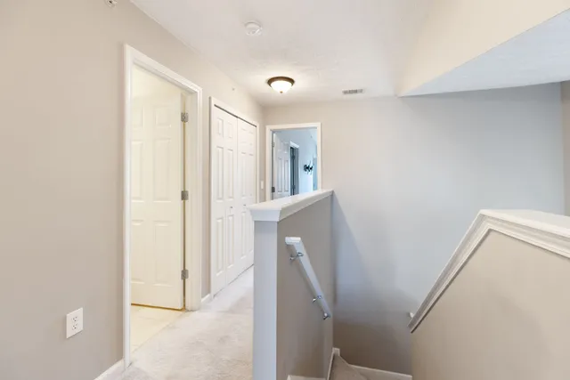 a view of a hallway with entryway
