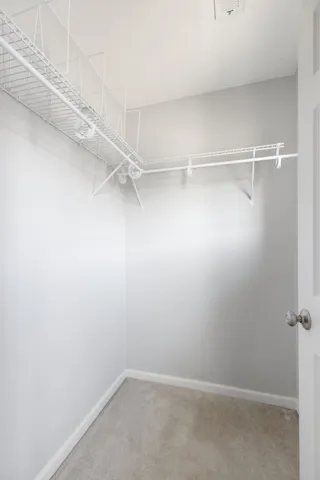 a view of an empty walk in closet