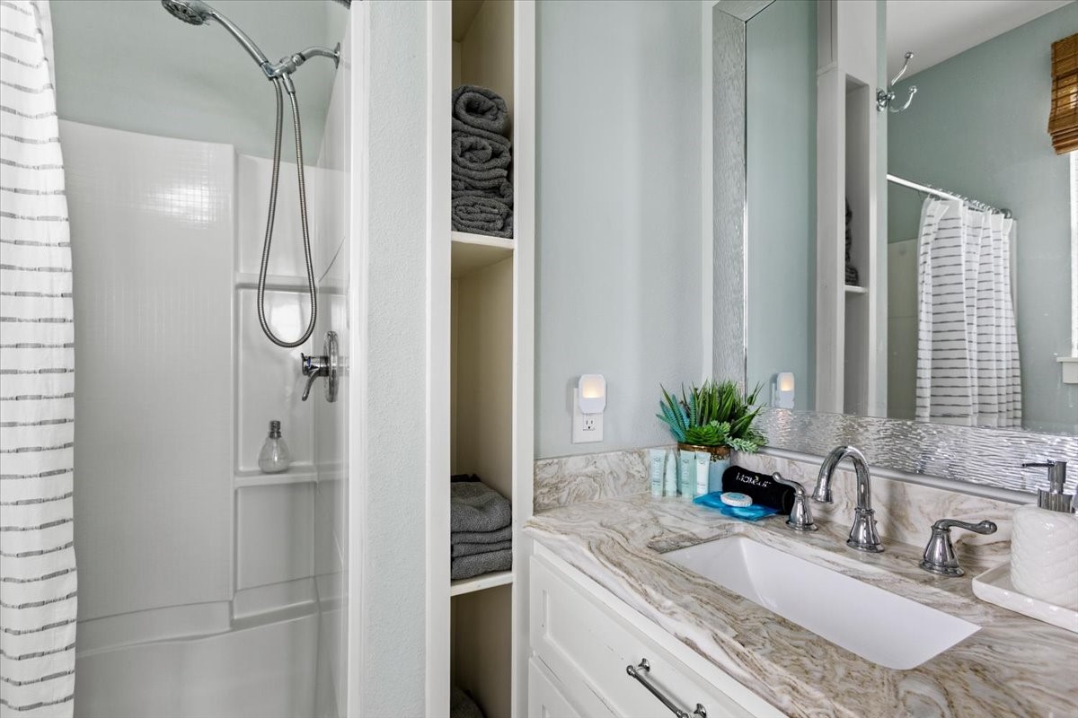 307 Olive Street Surfside Beach, TX 77541 - Photo 13 of 23 1st Primary ensuite bathroom