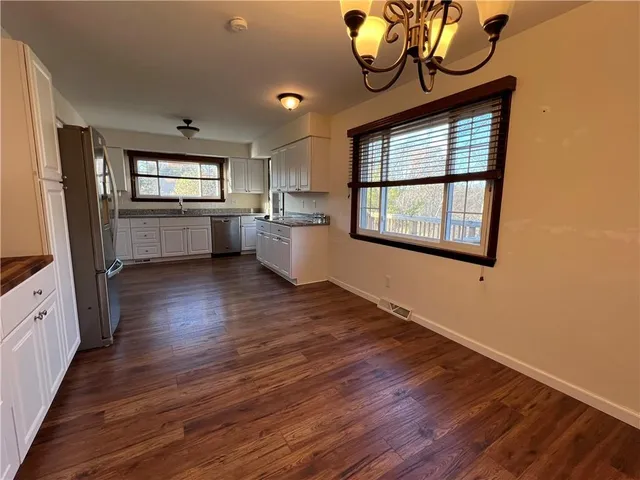 a view of balcony with furniture
