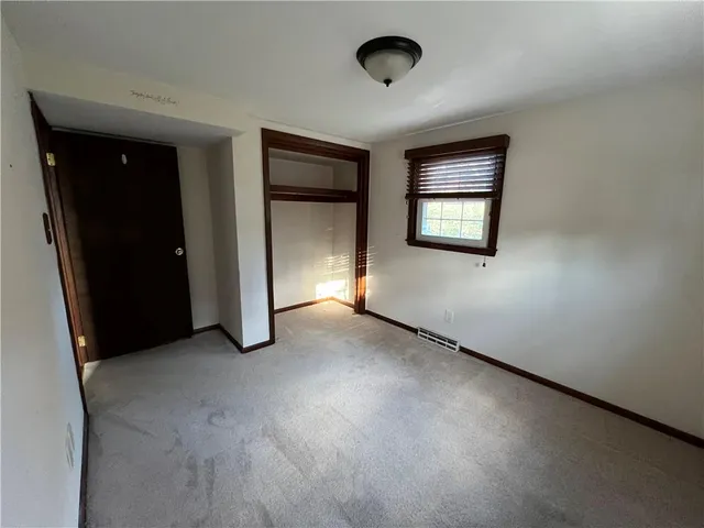 a view of a bathroom with sink and mirror