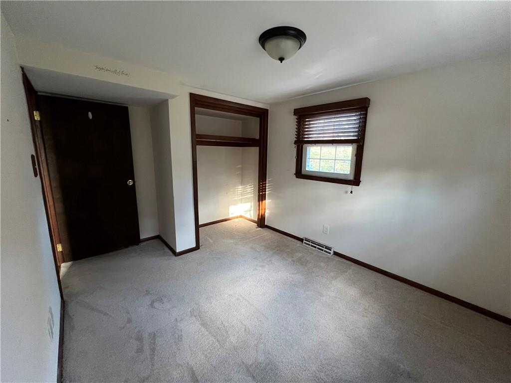 143 La Ray Drive Butler, PA 16001 - Photo 23 of 43 an empty room with windows and closet