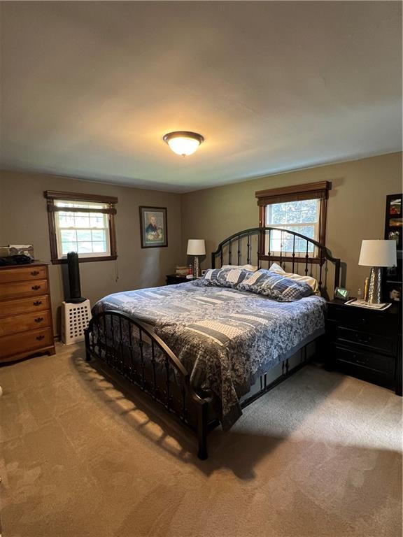 143 La Ray Drive Butler, PA 16001 - Photo 27 of 43 a bedroom with a bed and dresser