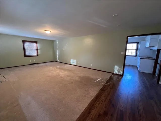 a kitchen with stainless steel appliances granite countertop a refrigerator stove and sink