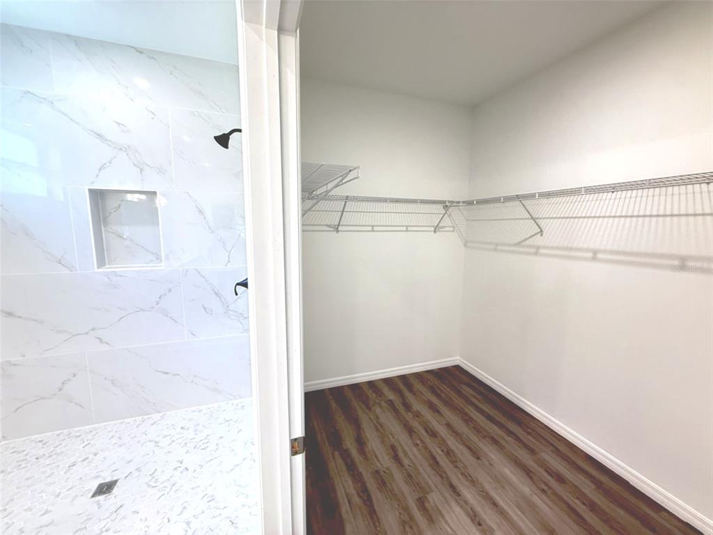 1294 Napoleon Road North Port, FL 34288 - Photo 12 of 25 a view of a room with wooden floor