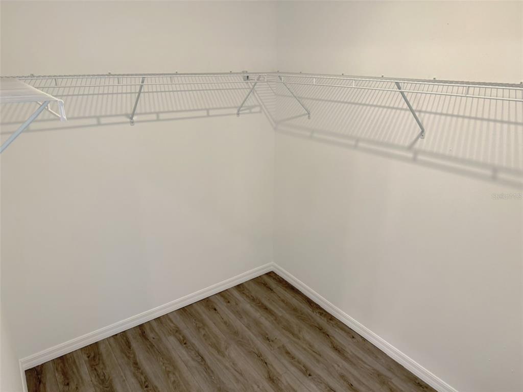 1294 Napoleon Road North Port, FL 34288 - Photo 20 of 25 a view of a room with racks on the wall