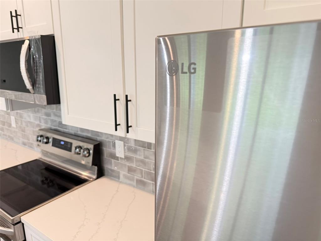 1294 Napoleon Road North Port, FL 34288 - Photo 4 of 25 a view of kitchen and utility room