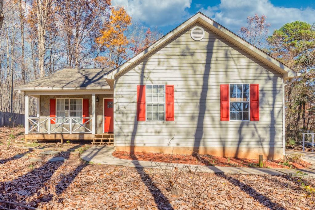 261 Mt Vernon Road Northwest Monroe, GA 30655 - Photo 1 of 1 a view of backyard of the house