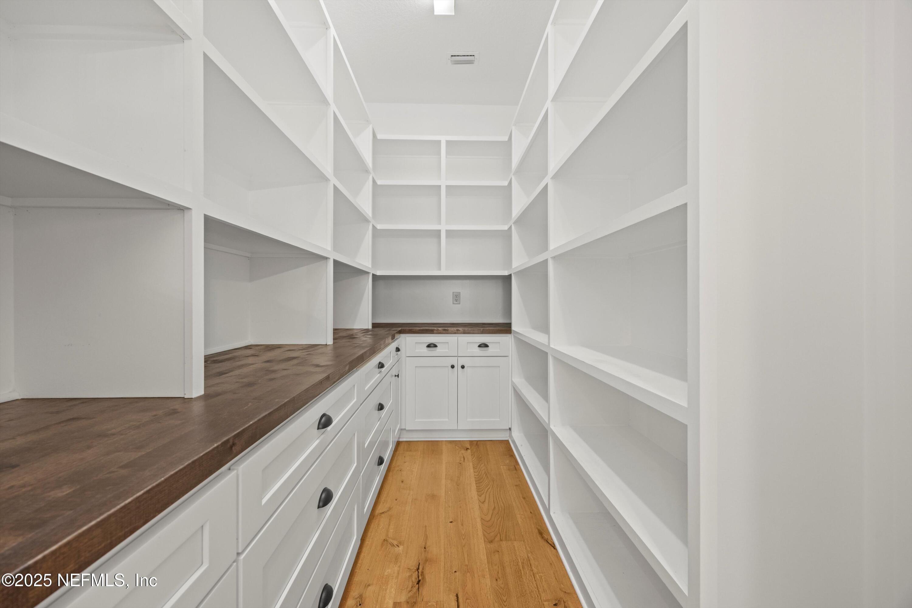 86 Sunset Ridge Court St. Johns, FL 32259 - Photo 20 of 66 a view of a hallway with wooden floor and entryway