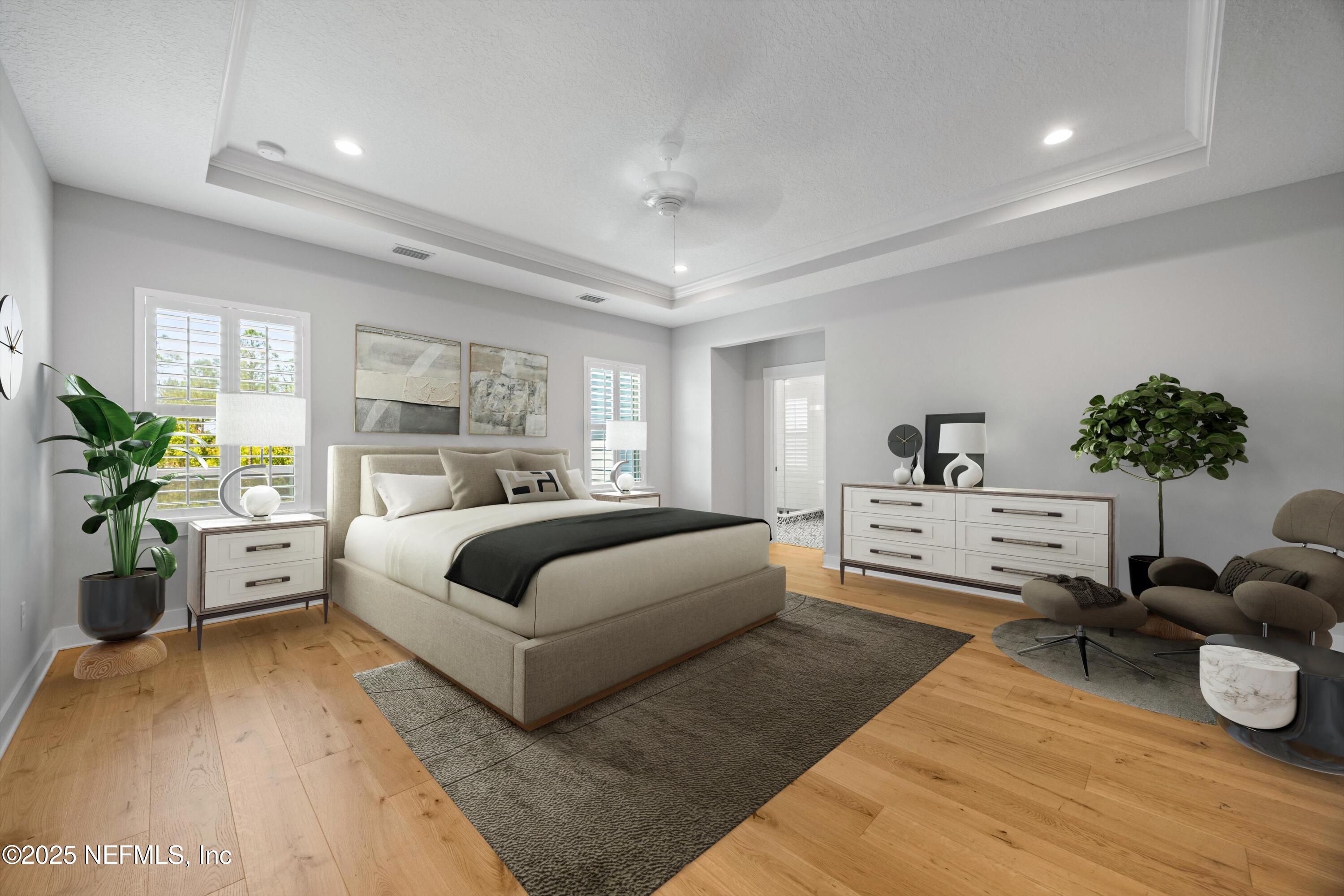 86 Sunset Ridge Court St. Johns, FL 32259 - Photo 25 of 66 a spacious bedroom with a large bed and a couch