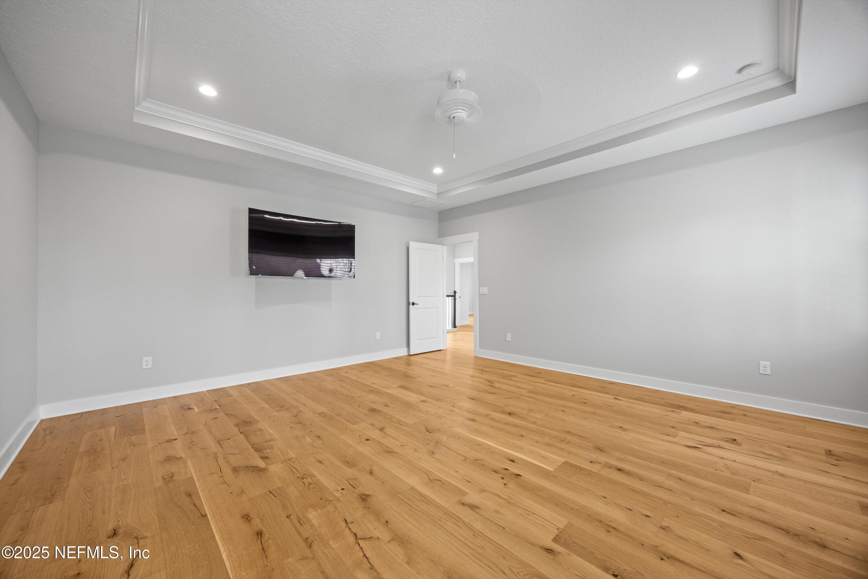 86 Sunset Ridge Court St. Johns, FL 32259 - Photo 27 of 66 a view of empty room with wooden floor