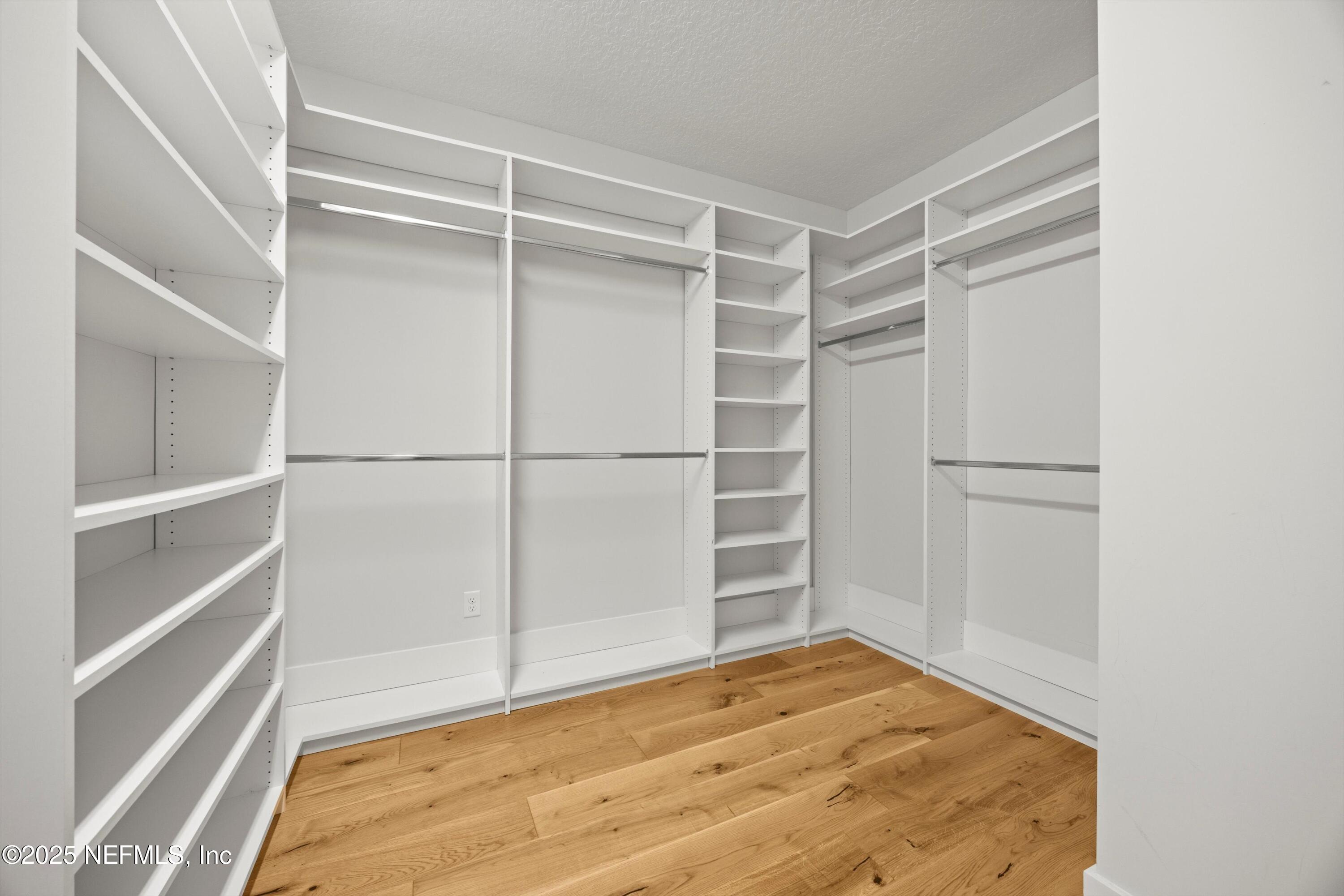 86 Sunset Ridge Court St. Johns, FL 32259 - Photo 34 of 66 a view of an empty room with wooden floor and a window
