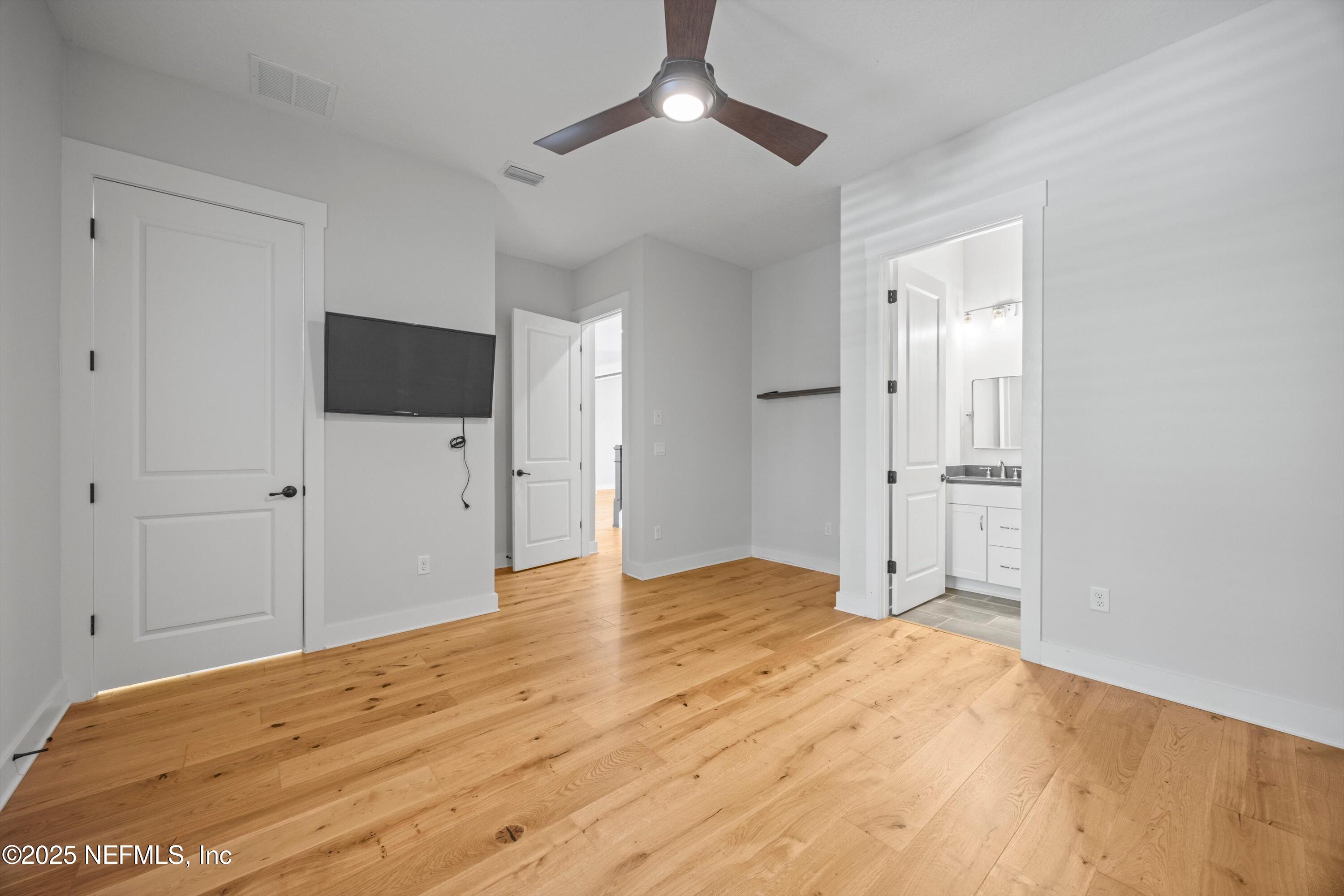 86 Sunset Ridge Court St. Johns, FL 32259 - Photo 40 of 66 a view of empty room with wooden floor